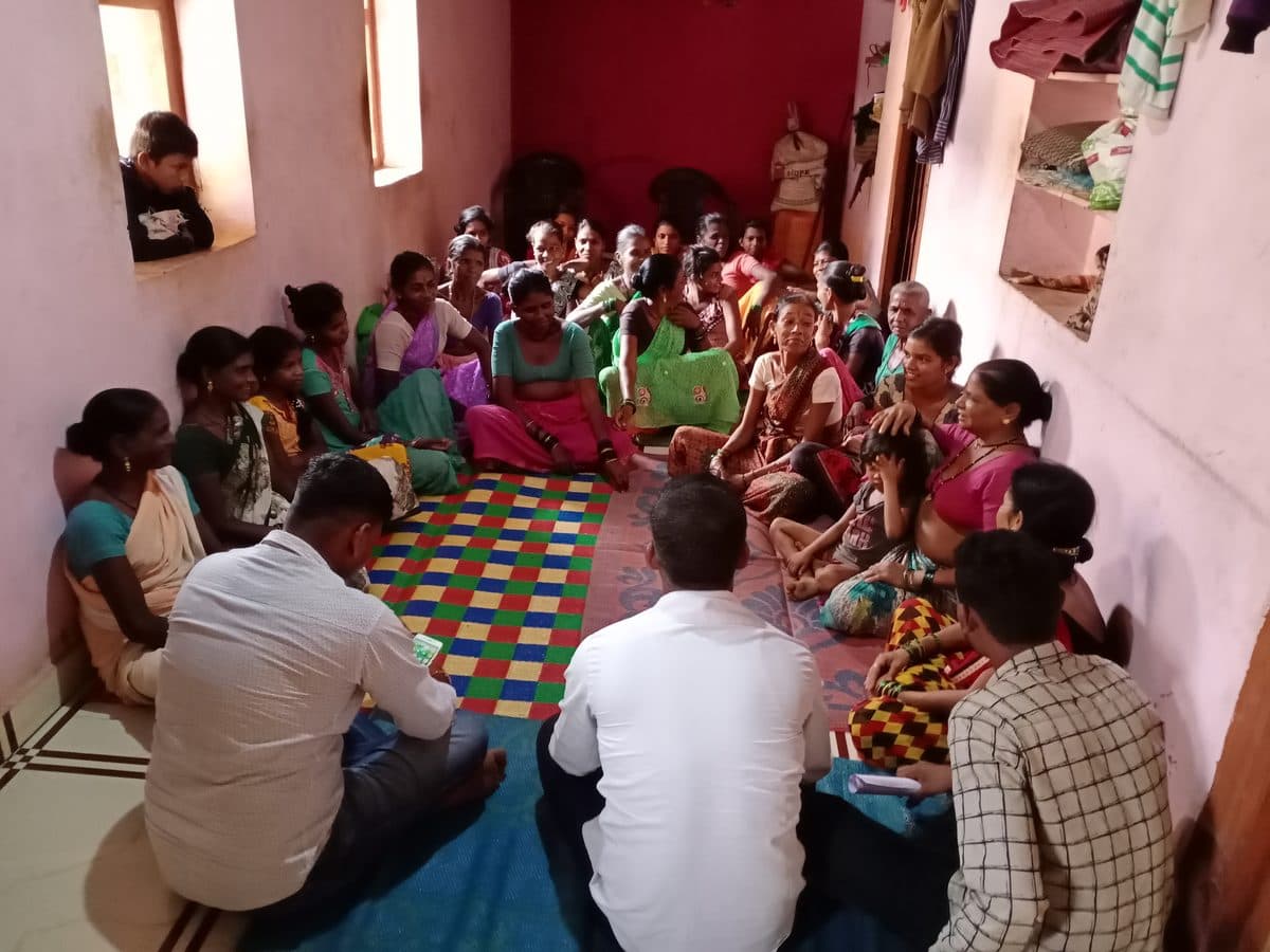 Women gathered for a self-help group meeting