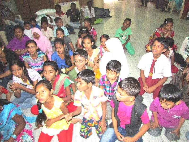 Children gathered at a community support programme