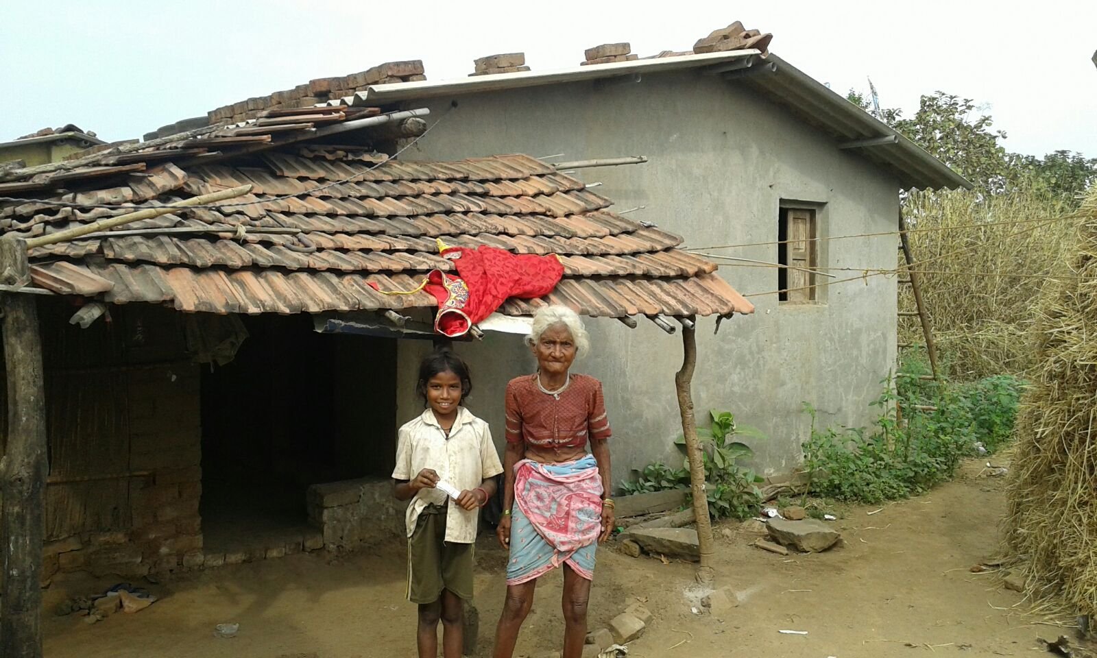 A family outside their home