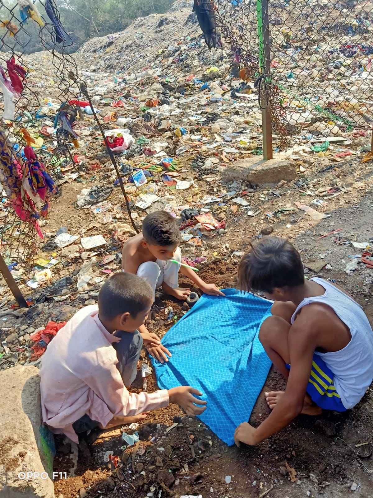 Children sorting through waste